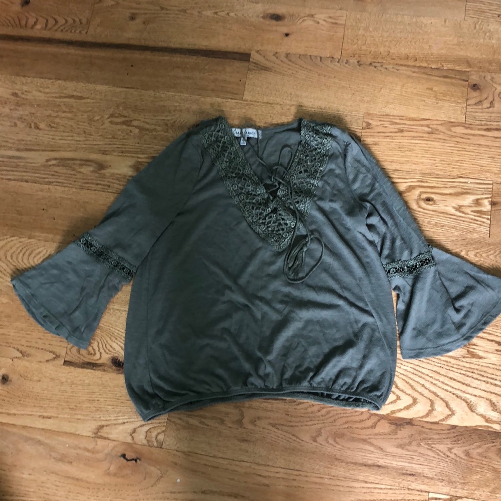 Green sweater.